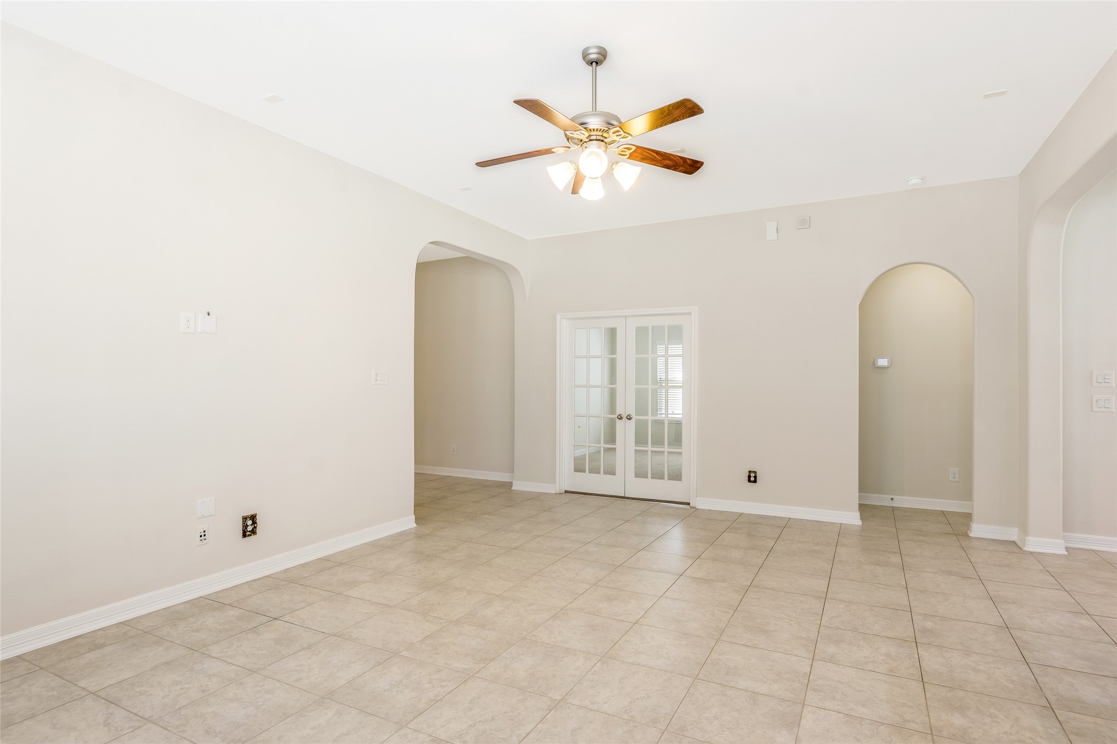 19906 Durwood Pines Lane Cypress, TX 77433 - Photo 7 of 26 an empty room with fan and windows