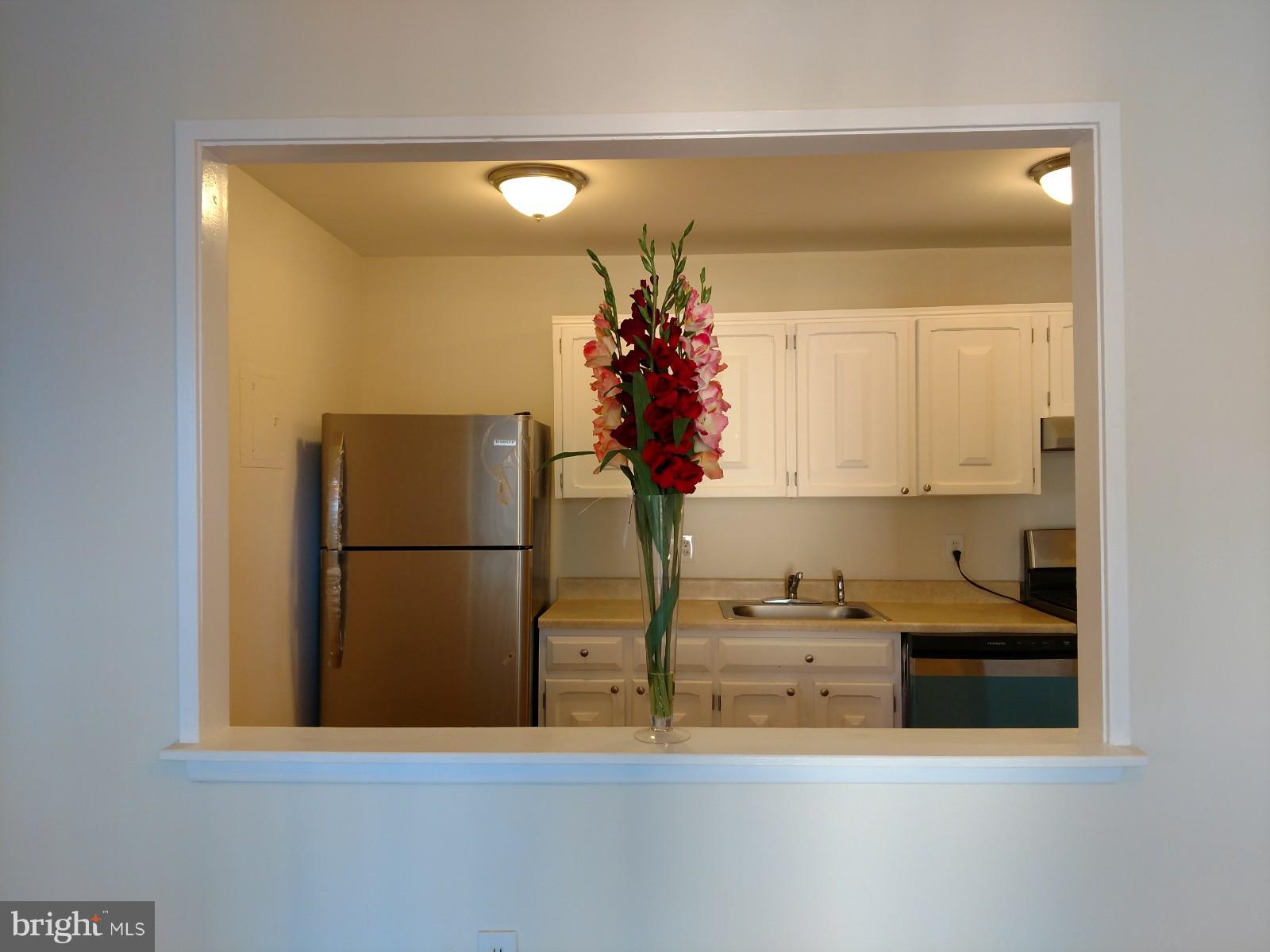 3754 Bel Pre Road, Unit 8 Silver Spring, MD 20906 - Photo 4 of 36 Kitchen pass thru for your convenience