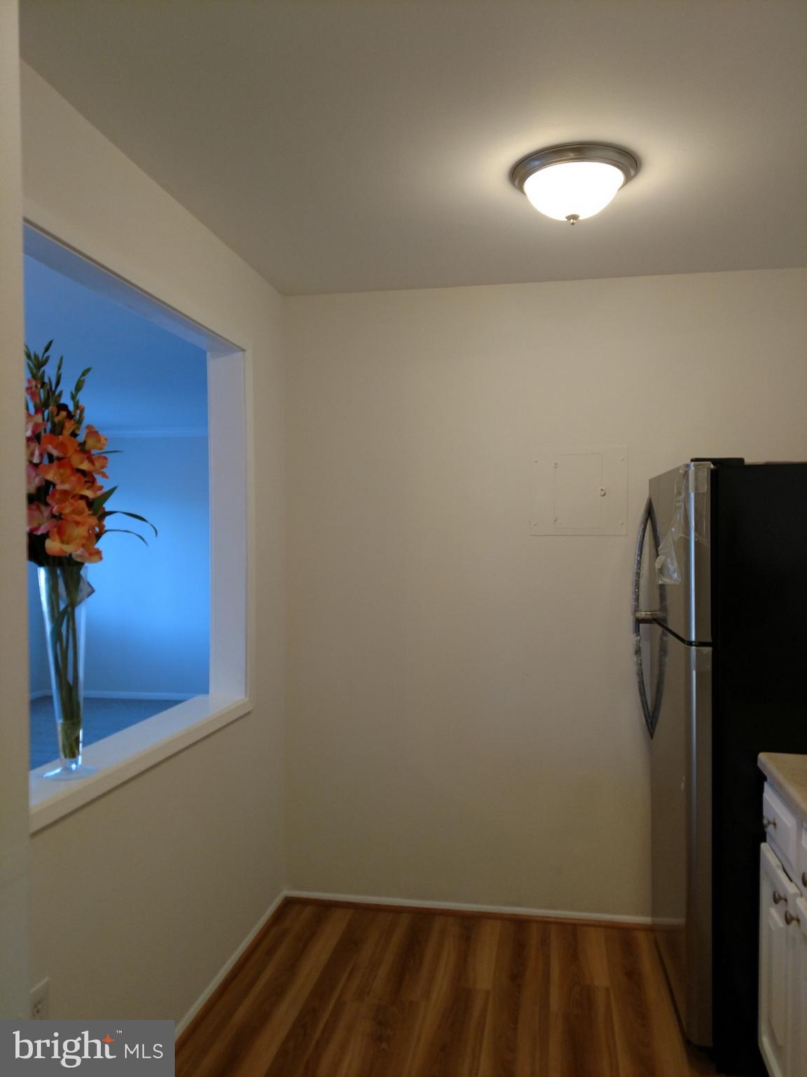 3754 Bel Pre Road, Unit 8 Silver Spring, MD 20906 - Photo 31 of 36 New kitchen flooring and updates