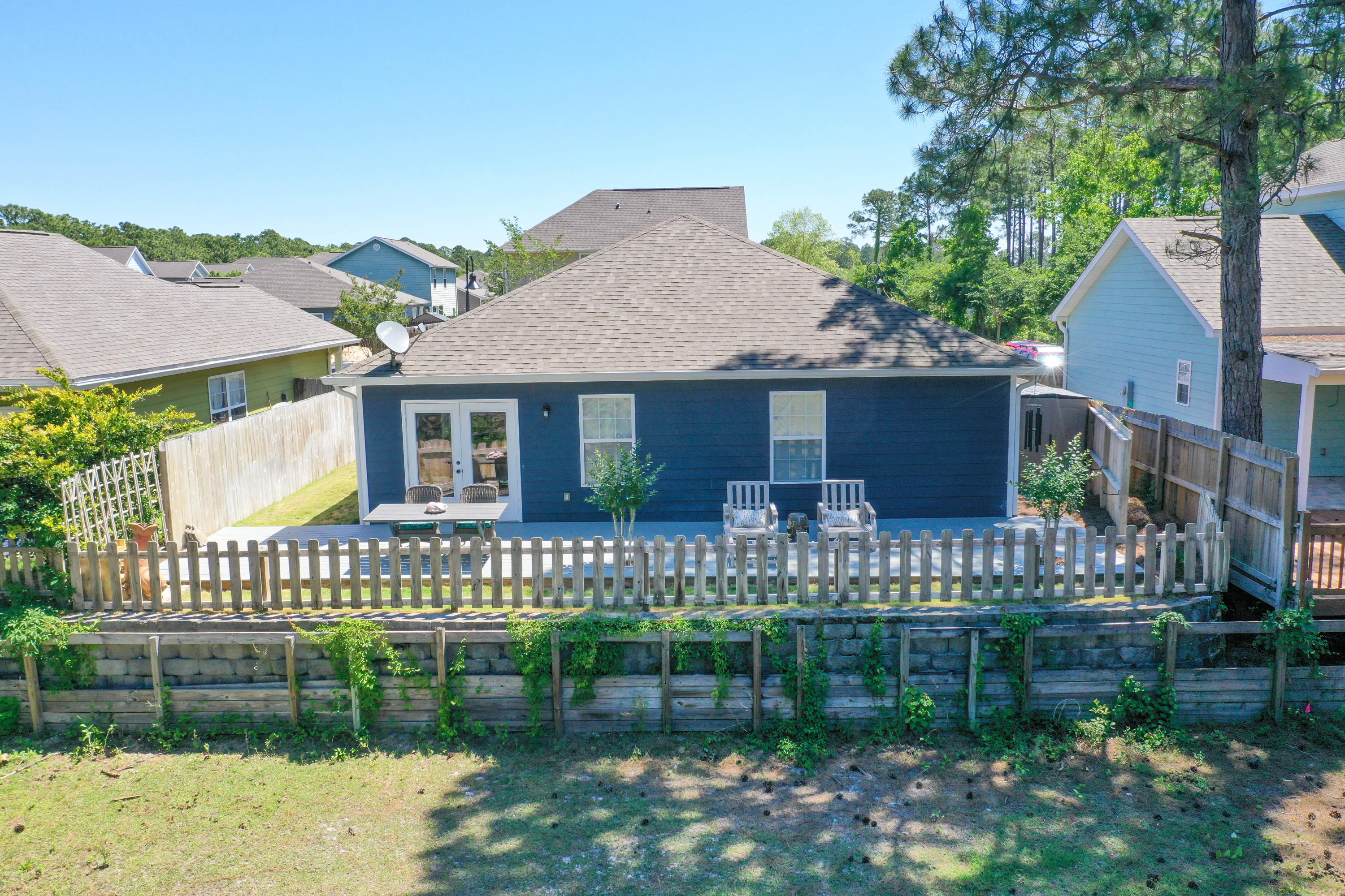 276 Water Oaks Loop Santa Rosa Beach, FL 32459 - Photo 25 of 29 Backyard and Deck