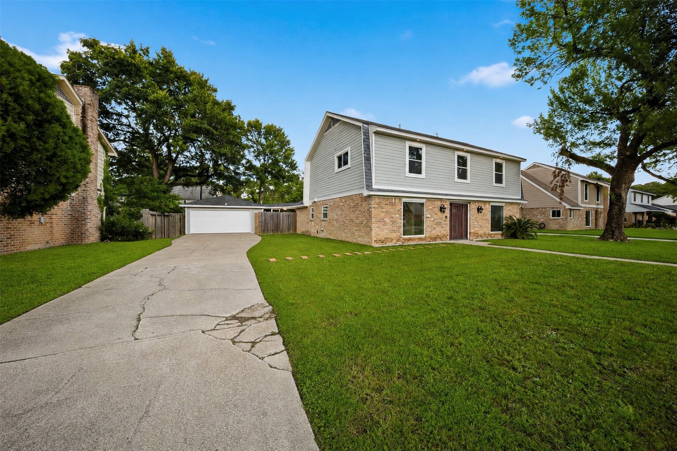 15414 Ripplestream Drive Houston, TX 77068 - Photo 4 of 41 Two car garage and long extended driveway for plenty of parking!
