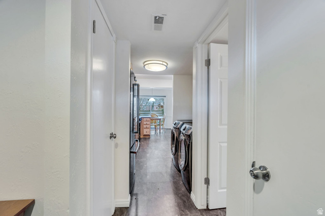 3221 North Shadowbrook Circle Provo, UT 84604 - Photo 19 of 29 Laundry area featuring baseboards and washer and dryer