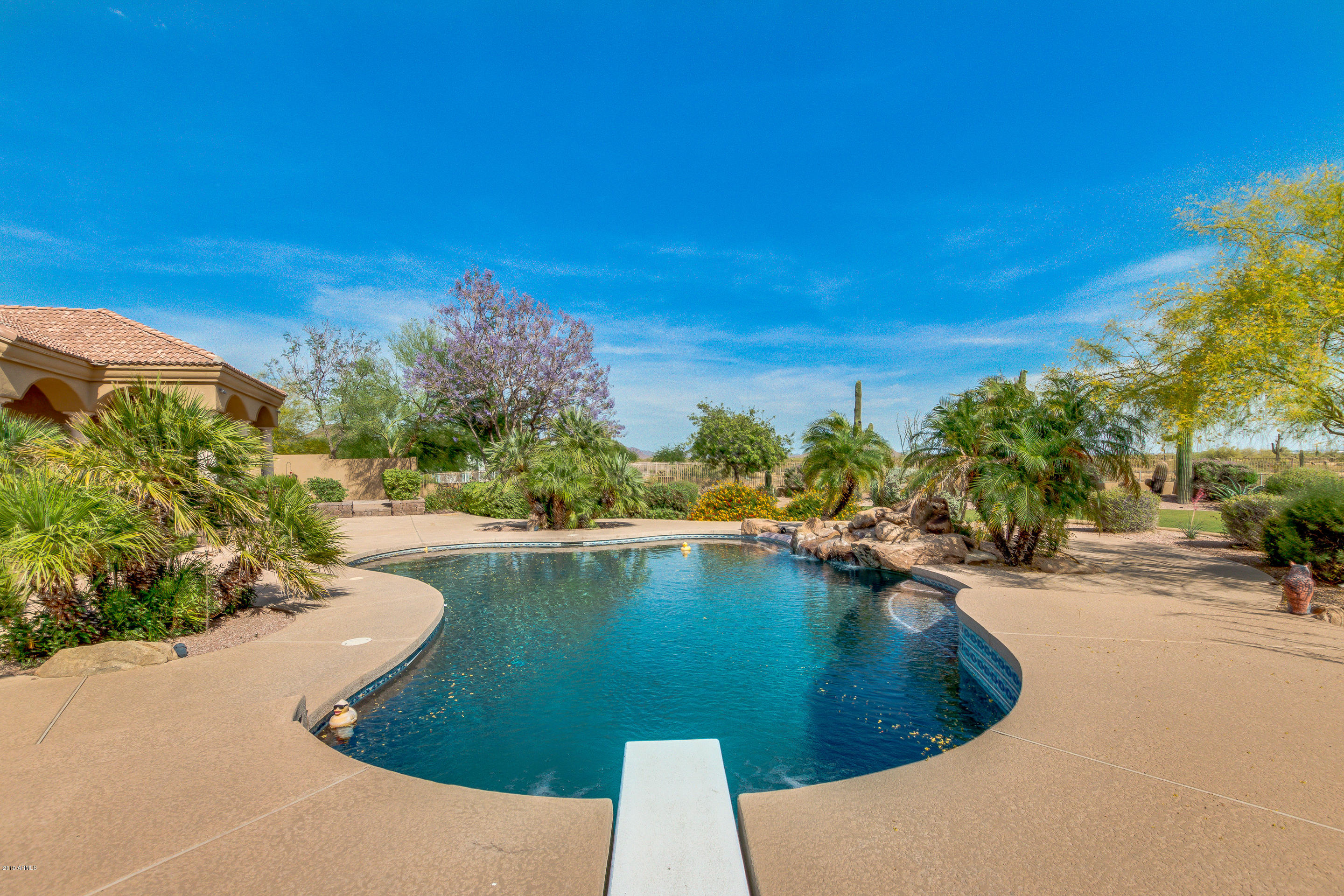 12327 East Doubletree Ranch Road Scottsdale, AZ 85259 - Photo 54 of 79 a view of a swimming pool and outdoor space