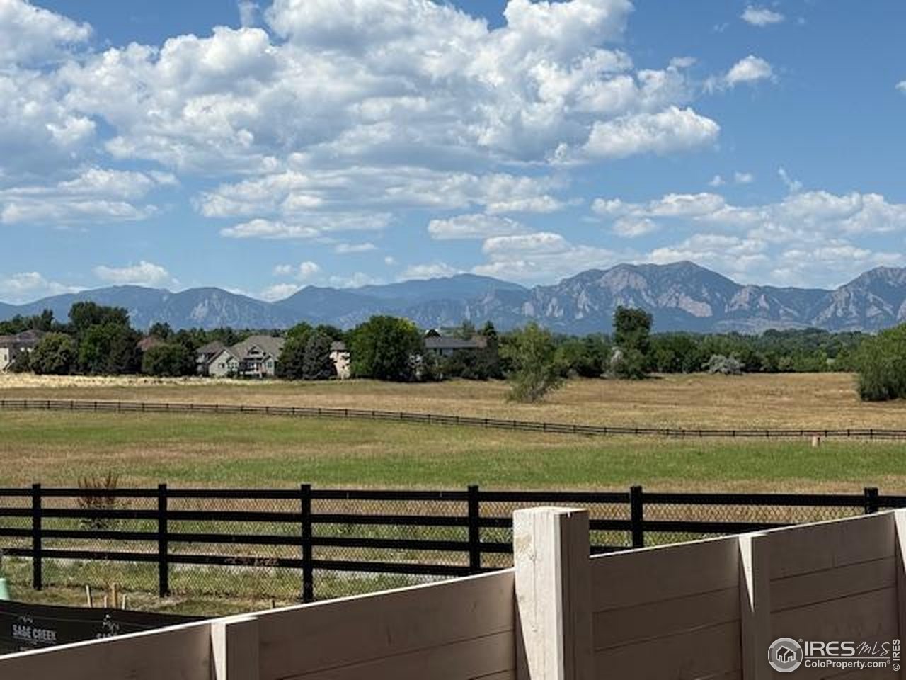 925 Latigo Loop Lafayette, CO 80026 - Photo 6 of 7 a view of lake with mountain