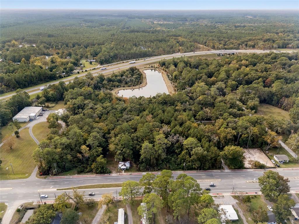 660 Highway 301 Baldwin, FL 32234 - Photo 5 of 16 an aerial view of residential houses with outdoor space