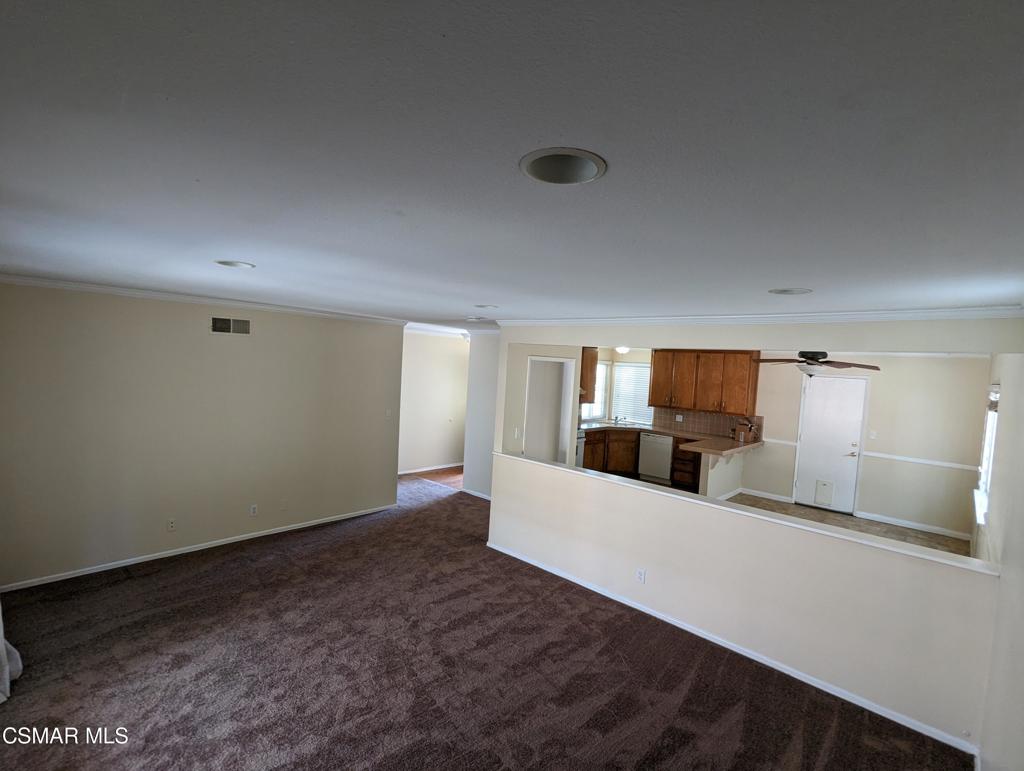 2441 Pierce Court Simi Valley, CA 93065 - Photo 2 of 11 a large bedroom with a bed and mirror on dresser