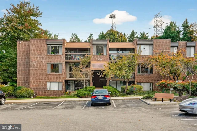 a car parked in front of a building