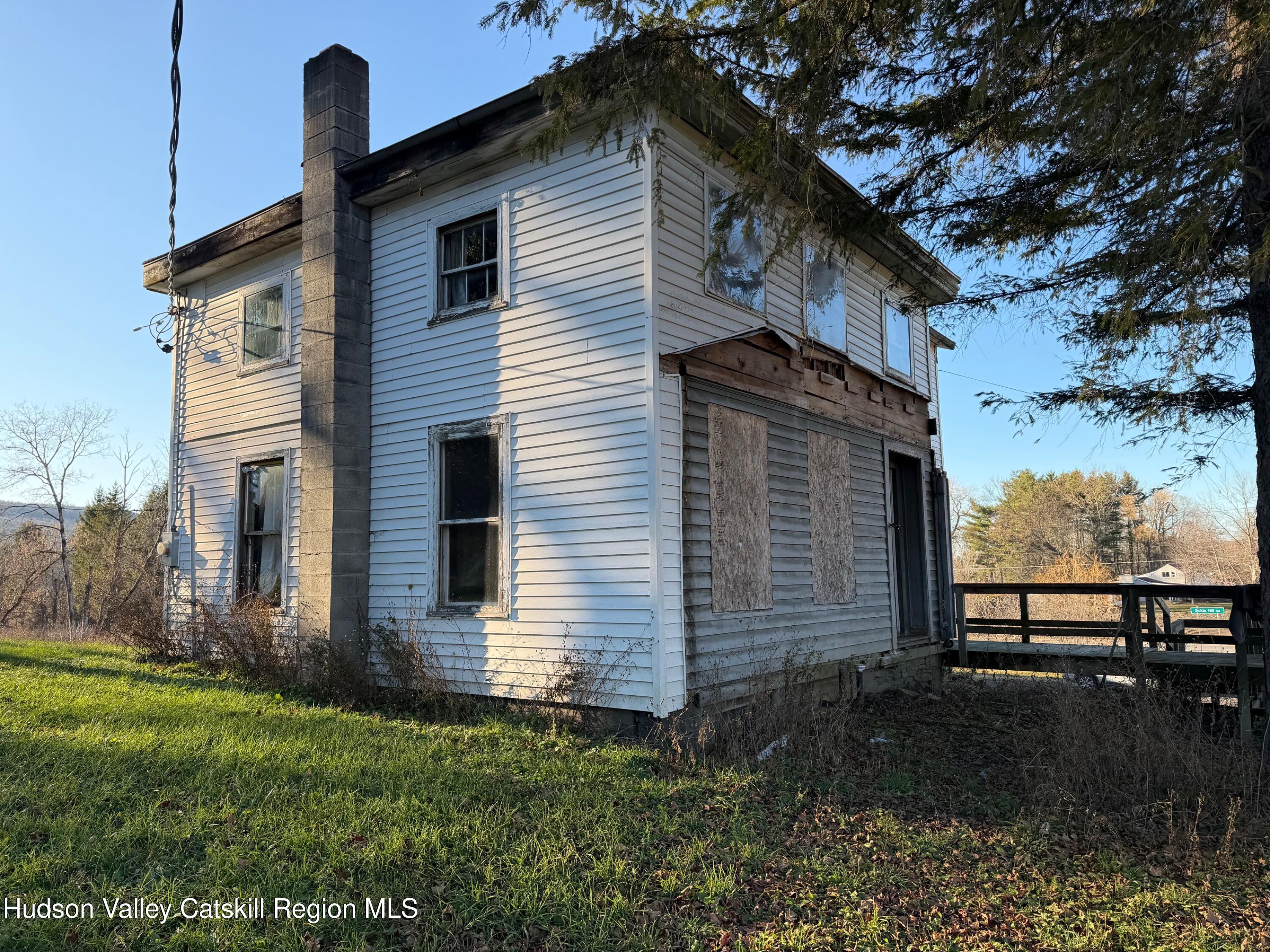 2075 Switzkill Road Berne, NY 12023 - Photo 7 of 7 a front view of a house with garden