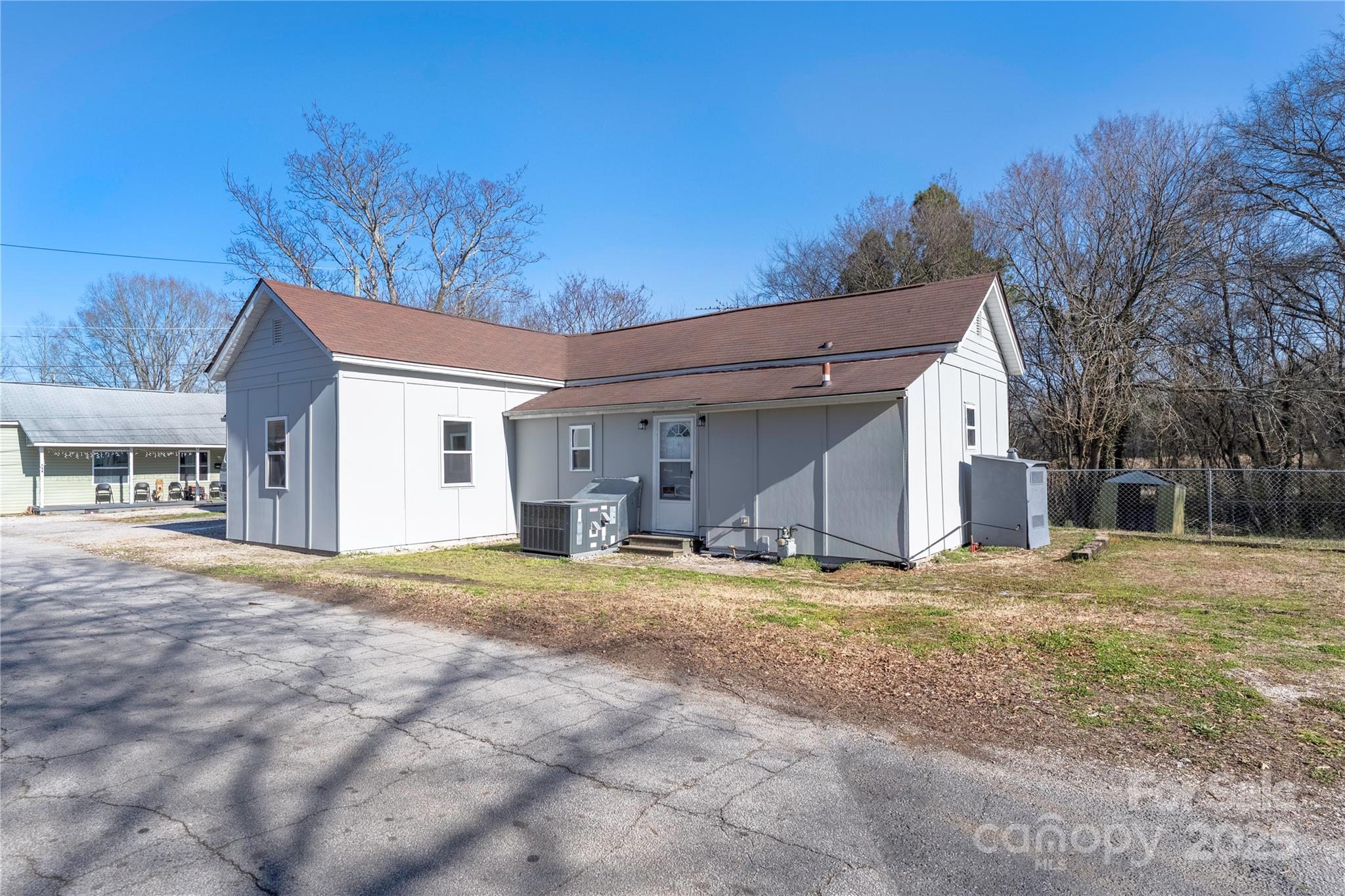 528 6th Street Chester, SC 29706 - Photo 2 of 31 a front view of a house with a yard and garage