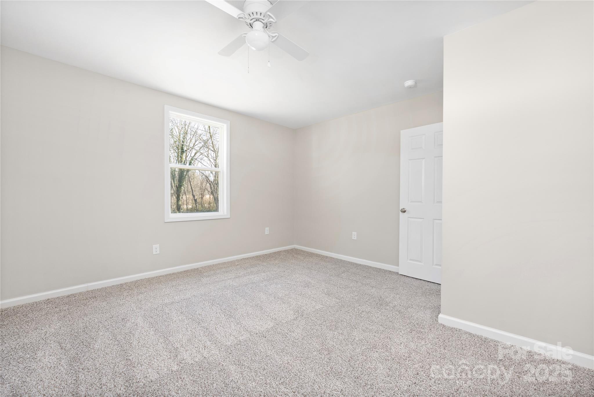 528 6th Street Chester, SC 29706 - Photo 22 of 31 an empty room with windows and fan