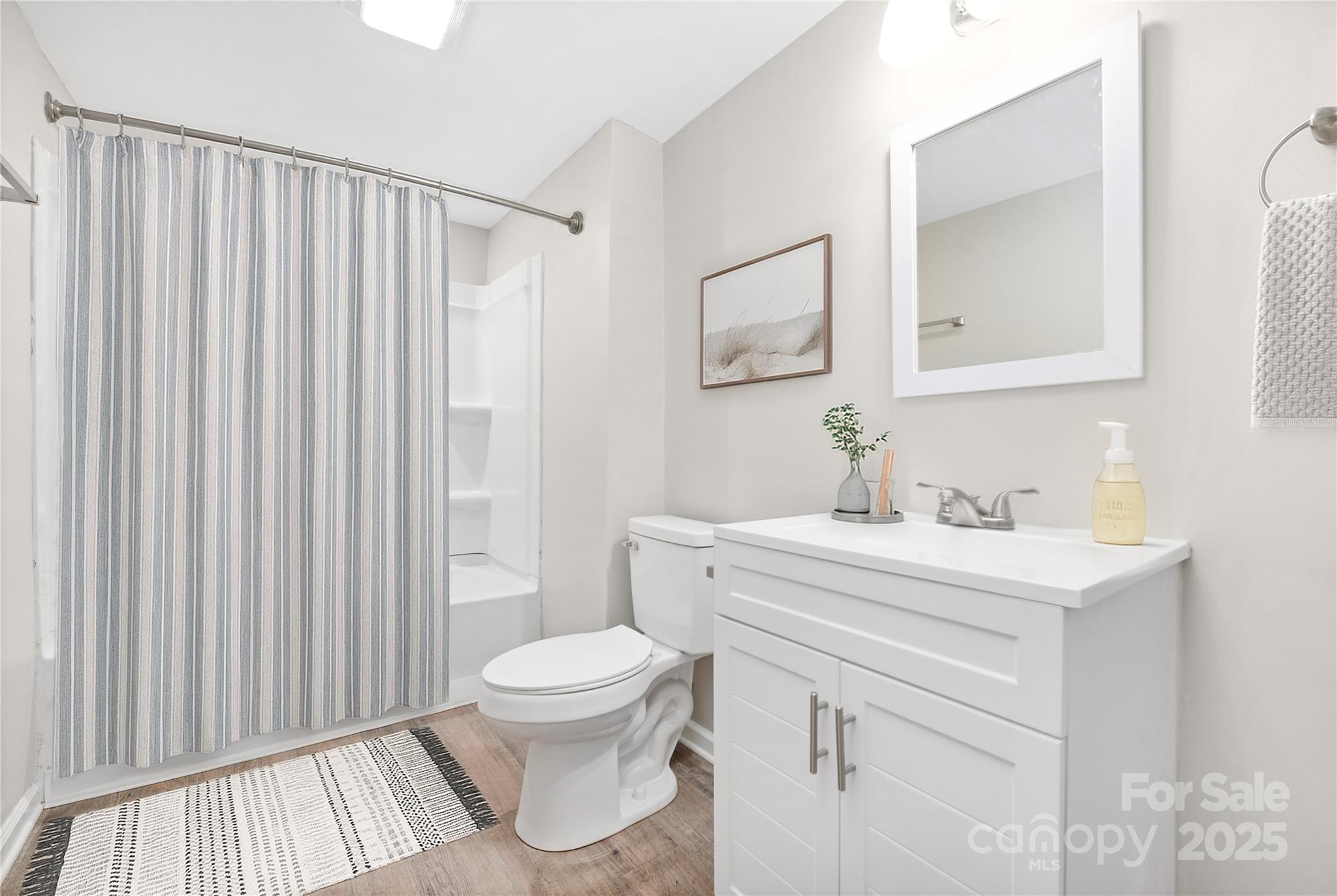 528 6th Street Chester, SC 29706 - Photo 6 of 31 a bathroom with a sink a toilet and a mirror