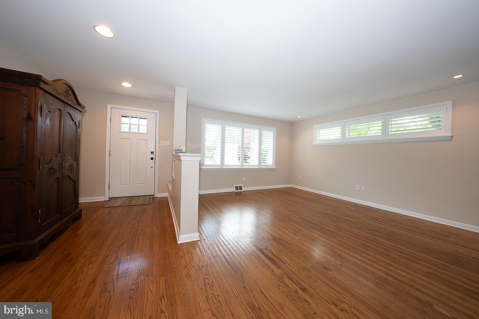 20 Fairview Road Swarthmore, PA 19081 - Photo 6 of 57 an empty room with wooden floor and windows