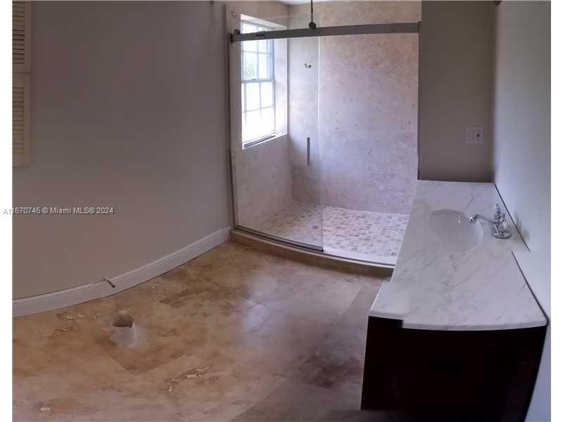 2424 Southwest 21st Street Miami, FL 33145 - Photo 4 of 9 a view of a room that has window in it