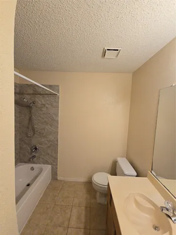 a bathroom with a sink and bathtub