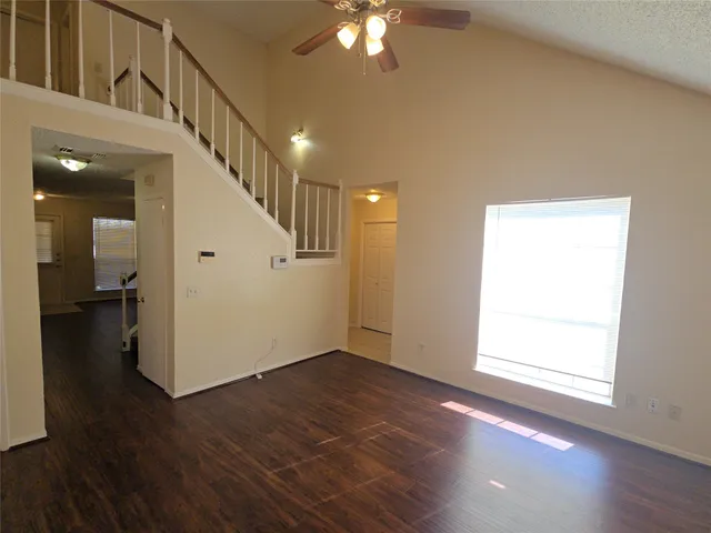an entryway in a hall with a window