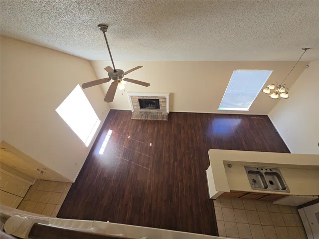 a view of a livingroom with wooden floor