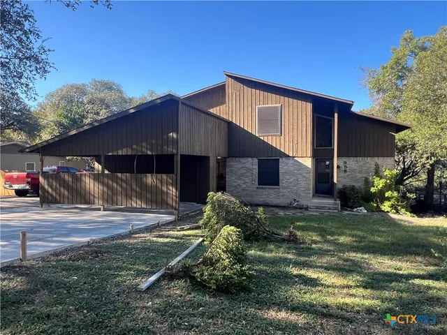 a backyard of a house with lots of green space