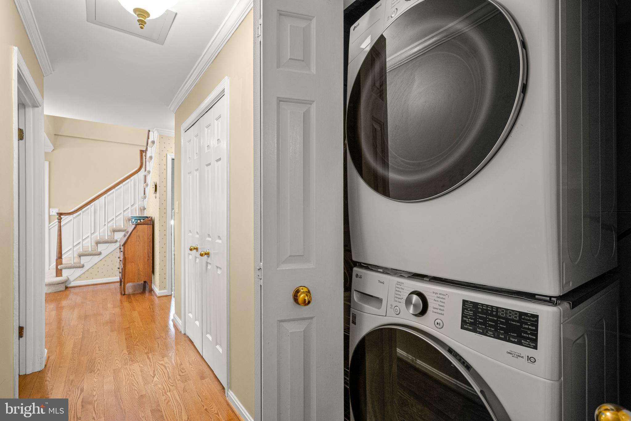 7491 Mink Hollow Road Highland, MD 20777 - Photo 12 of 67 a view of a hallway with washer and dryer