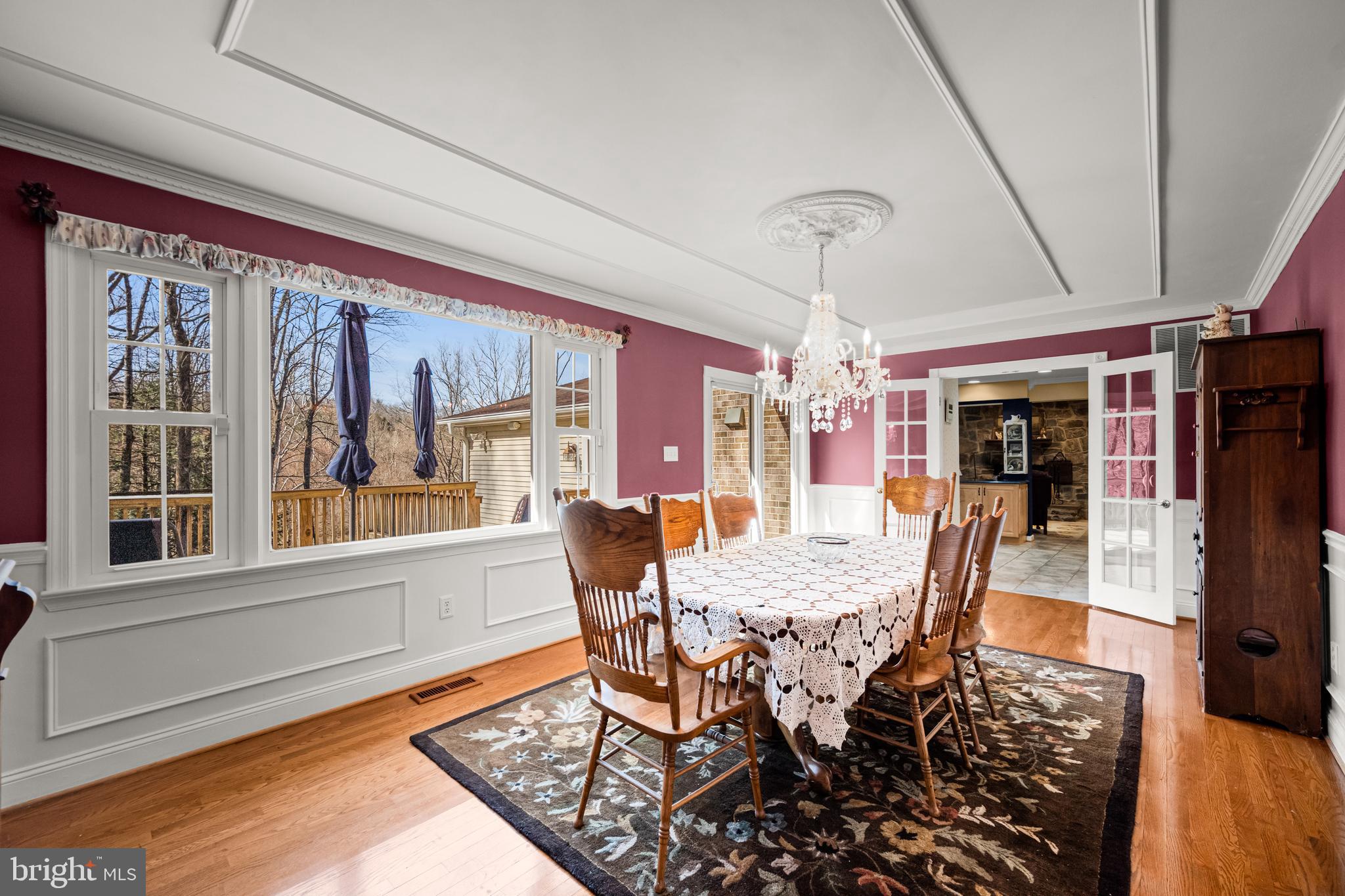 7491 Mink Hollow Road Highland, MD 20777 - Photo 20 of 67 a view of a dining room with furniture window and wooden floor