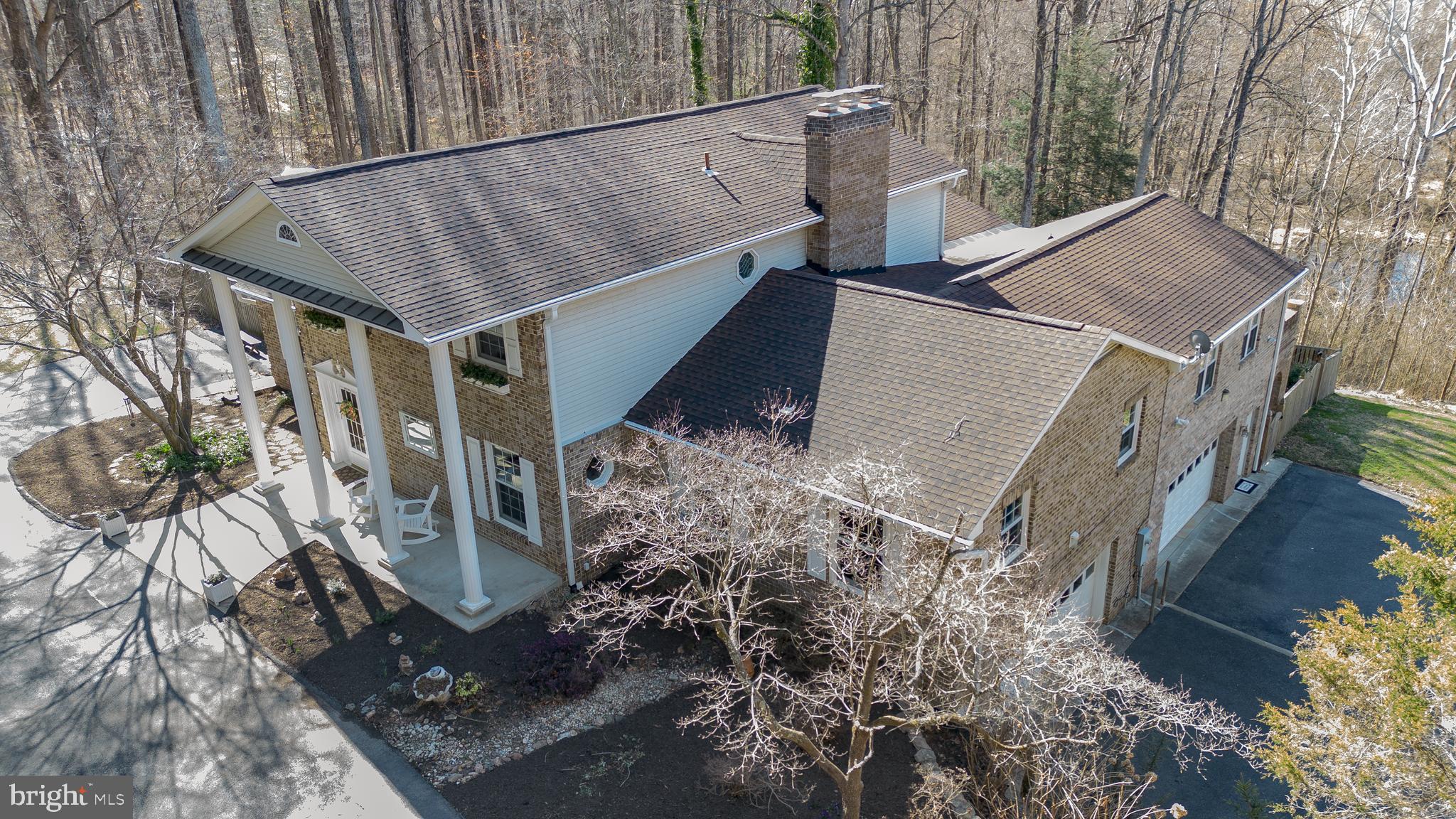 7491 Mink Hollow Road Highland, MD 20777 - Photo 2 of 67 a backyard of a house with lots of green space