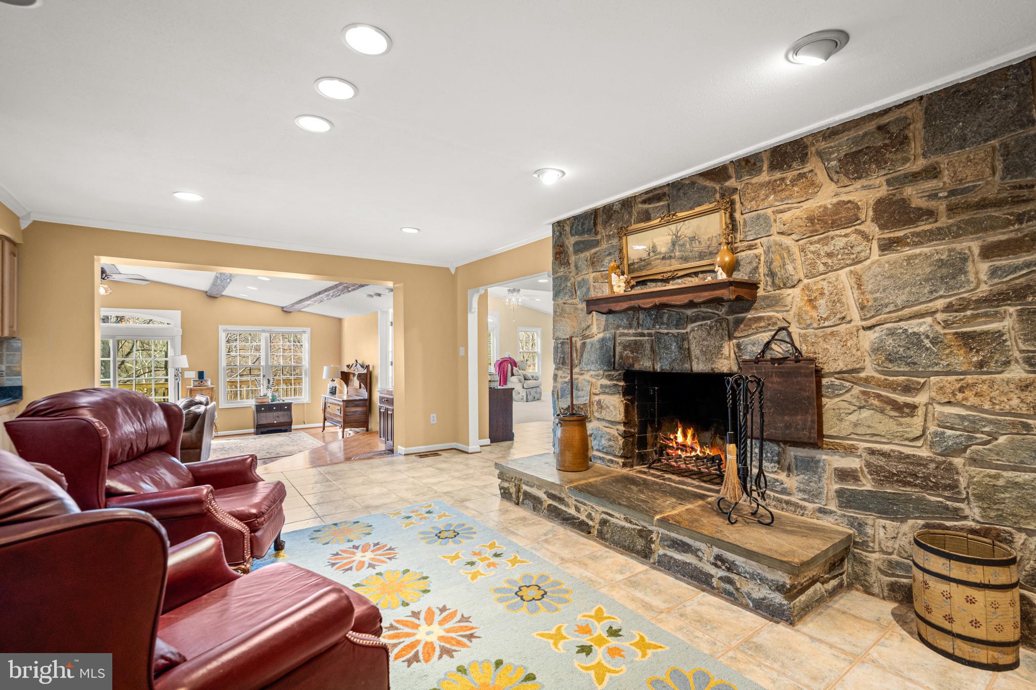 7491 Mink Hollow Road Highland, MD 20777 - Photo 25 of 67 a living room with furniture and a fireplace