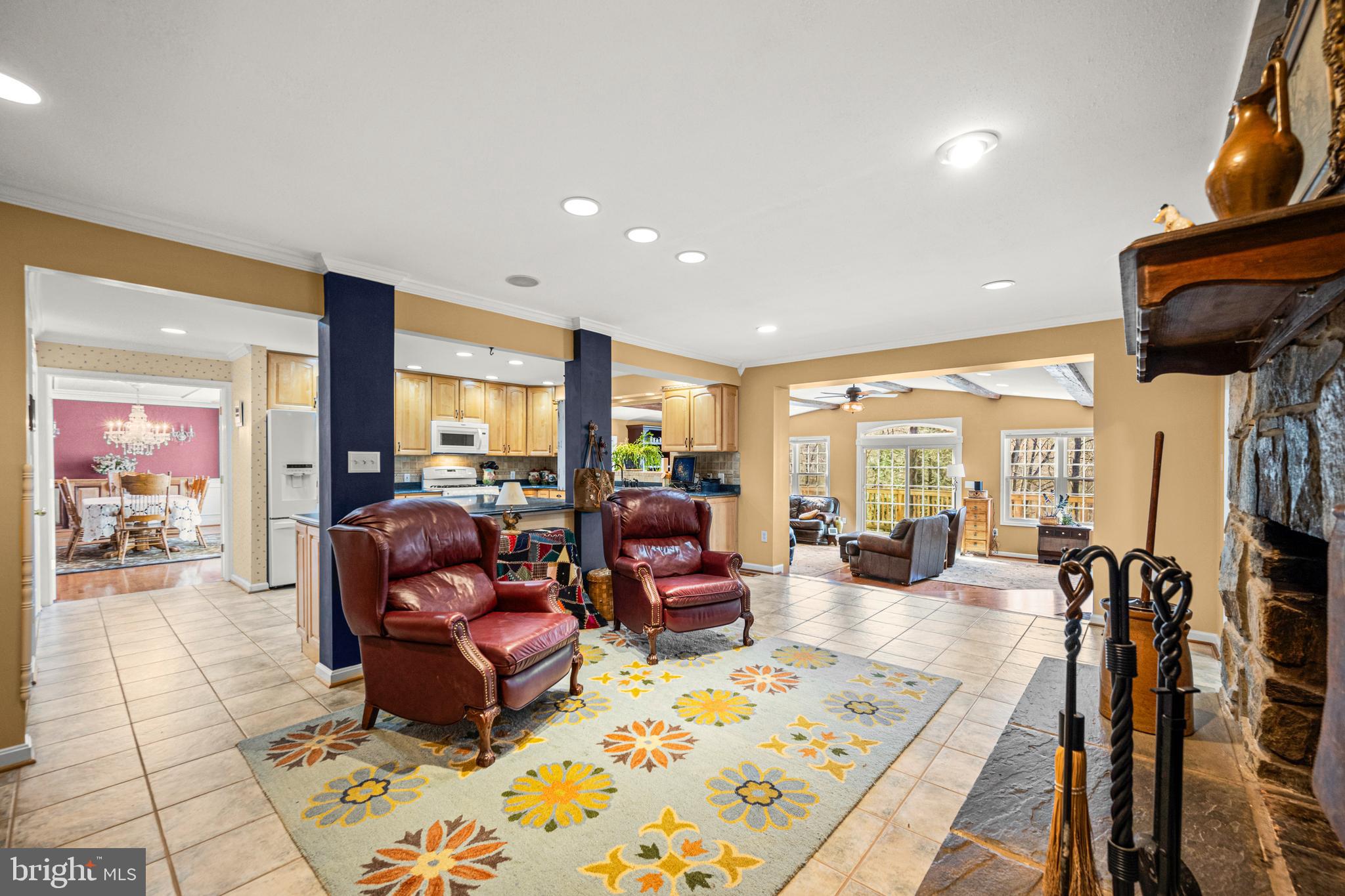 7491 Mink Hollow Road Highland, MD 20777 - Photo 26 of 67 a living room with furniture fireplace and rug floor