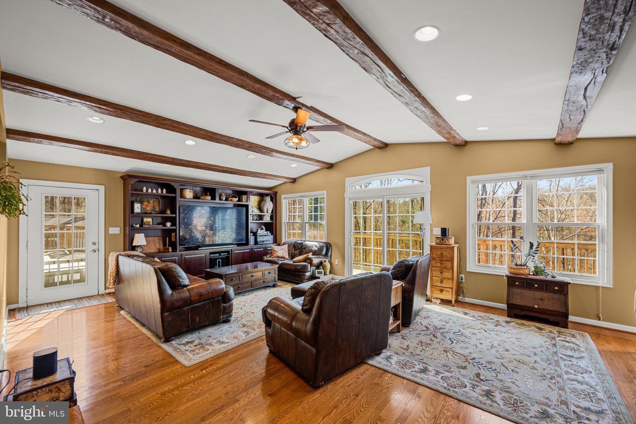 7491 Mink Hollow Road Highland, MD 20777 - Photo 27 of 67 a living room with furniture and a large window