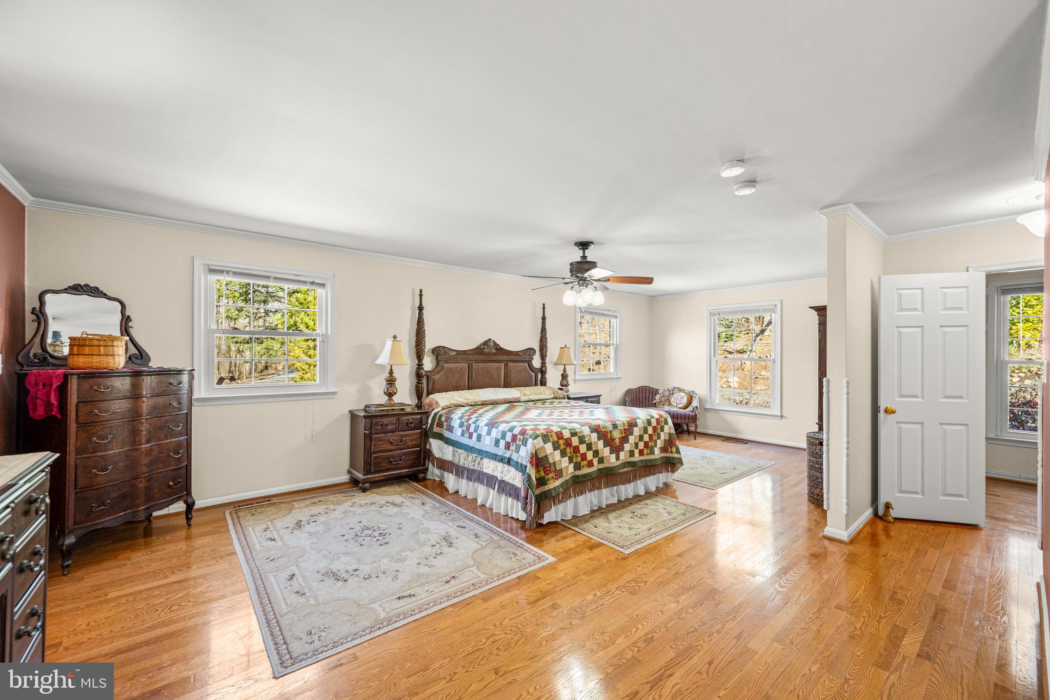 7491 Mink Hollow Road Highland, MD 20777 - Photo 35 of 67 a bedroom with a bed and wooden floor