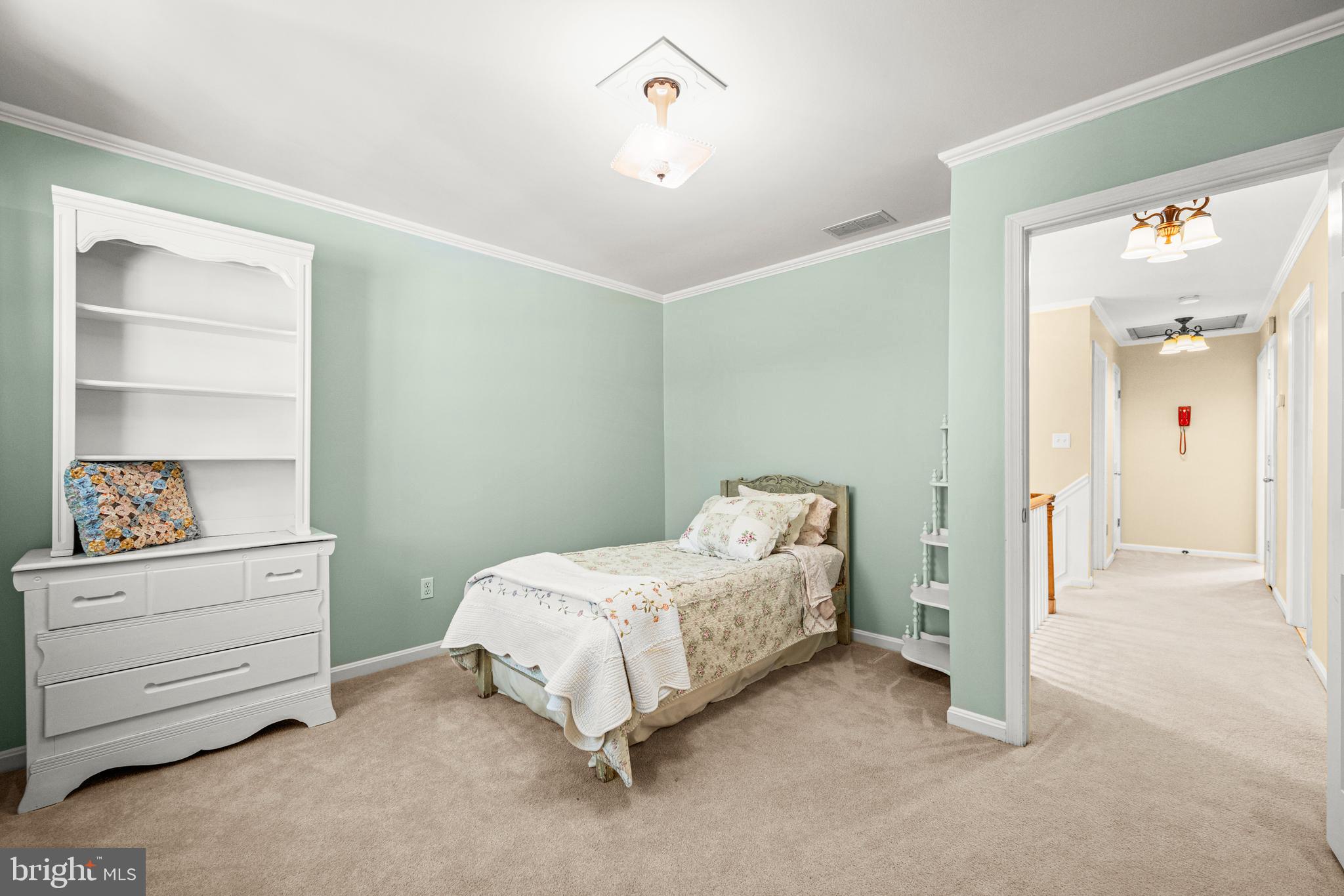 7491 Mink Hollow Road Highland, MD 20777 - Photo 45 of 67 a bedroom with a bed and cabinets