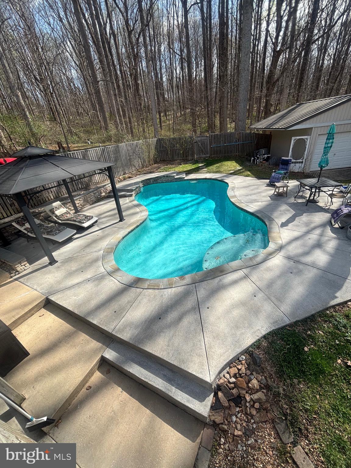7491 Mink Hollow Road Highland, MD 20777 - Photo 64 of 67 a view of a backyard with sitting area