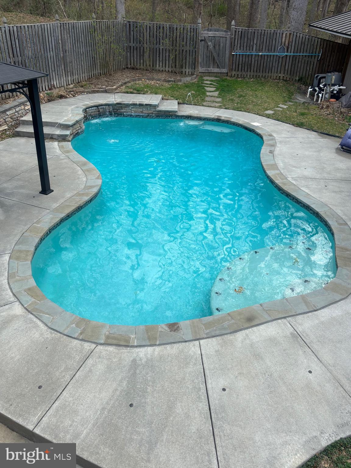 7491 Mink Hollow Road Highland, MD 20777 - Photo 65 of 67 a view of swimming pool having outdoor seating