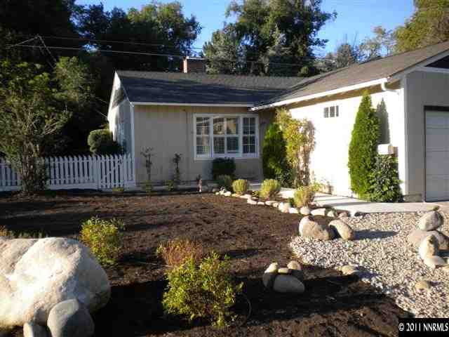 1720 Vale Street Reno, NV 89509 - Photo 1 of 13 a front view of a house with a yard