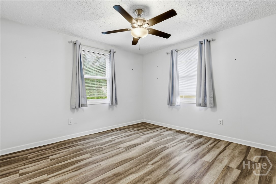 3214 Hazel Street Savannah, GA 31404 - Photo 14 of 23 back bedroom; primary w its own full bath