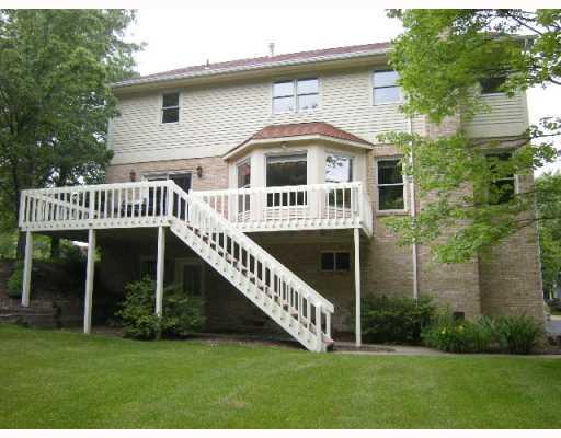 315 Blue Run Road Cheswick, PA 15024 - Photo 2 of 14 Exterior Back. Wear view highlights the large deck and walk-out basement.