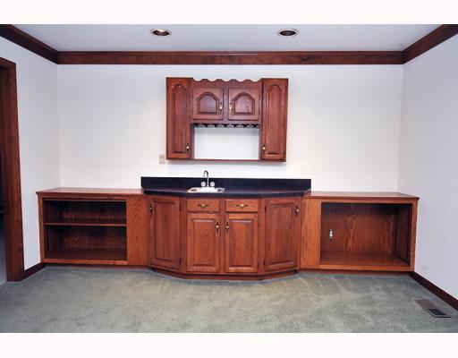 315 Blue Run Road Cheswick, PA 15024 - Photo 8 of 14 Den/Family/Great Room. Built-in with wet bar in the great room.