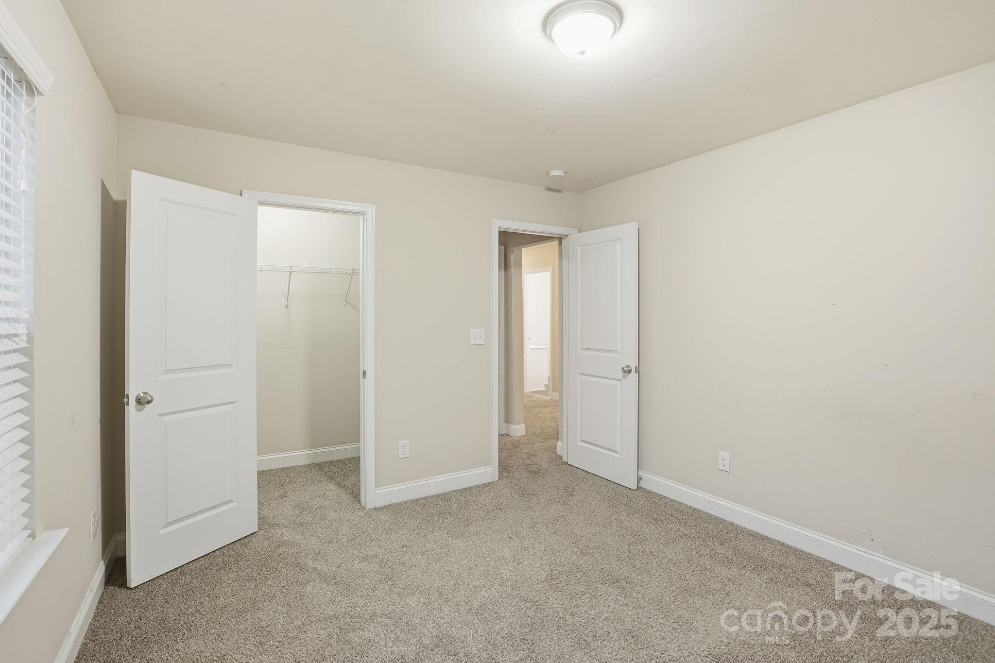 182 Sassafras Road Mooresville, NC 28115 - Photo 23 of 47 an empty room with closet area