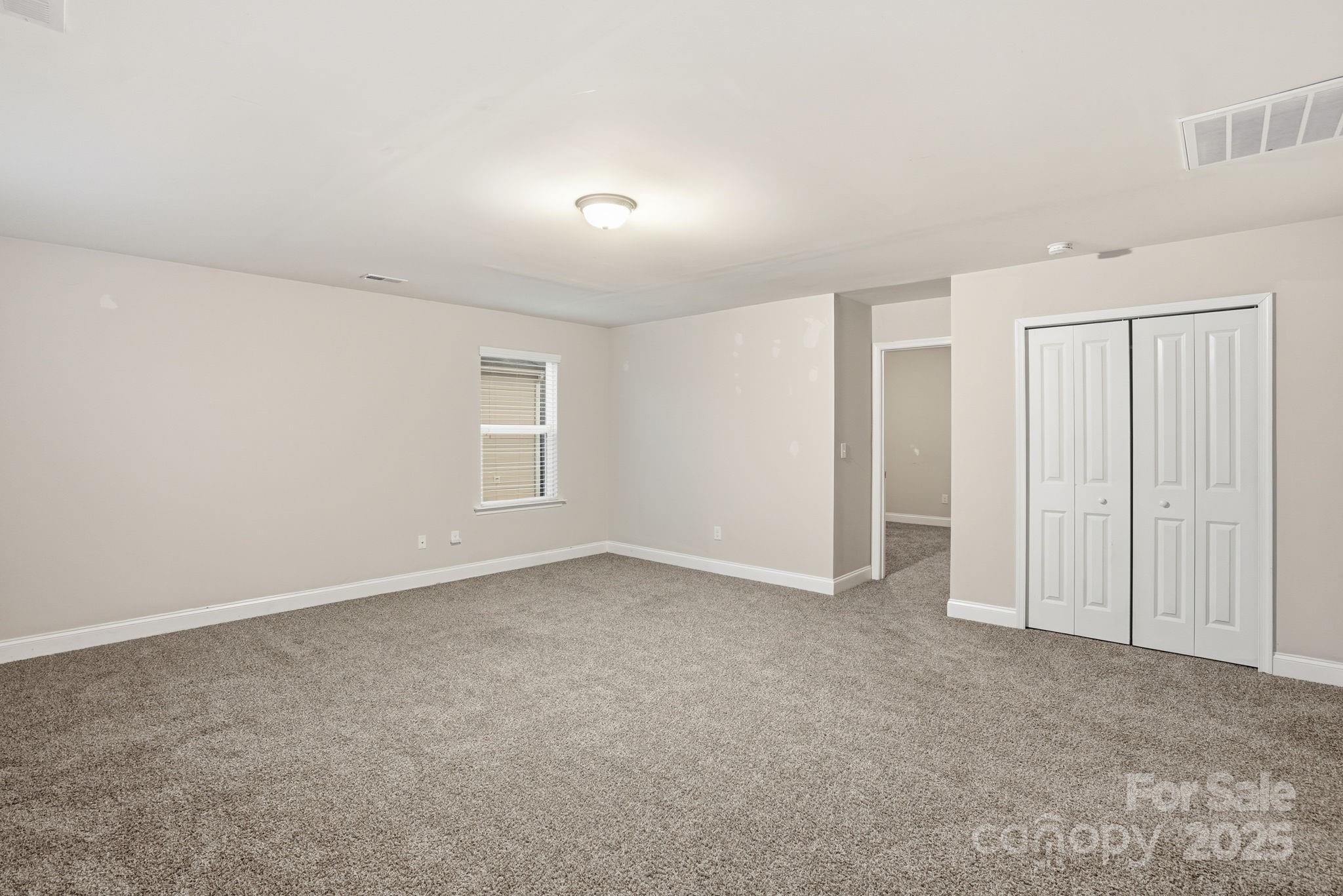 182 Sassafras Road Mooresville, NC 28115 - Photo 27 of 47 an empty room with closet area