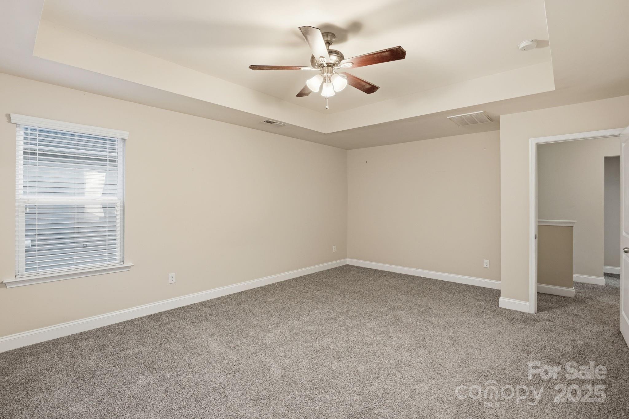 182 Sassafras Road Mooresville, NC 28115 - Photo 30 of 47 a view of an empty room with a window