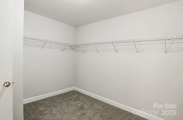 a view of a room with racks on the wall