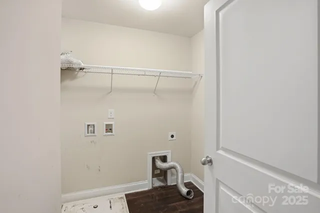 a view of small space with racks on the wall