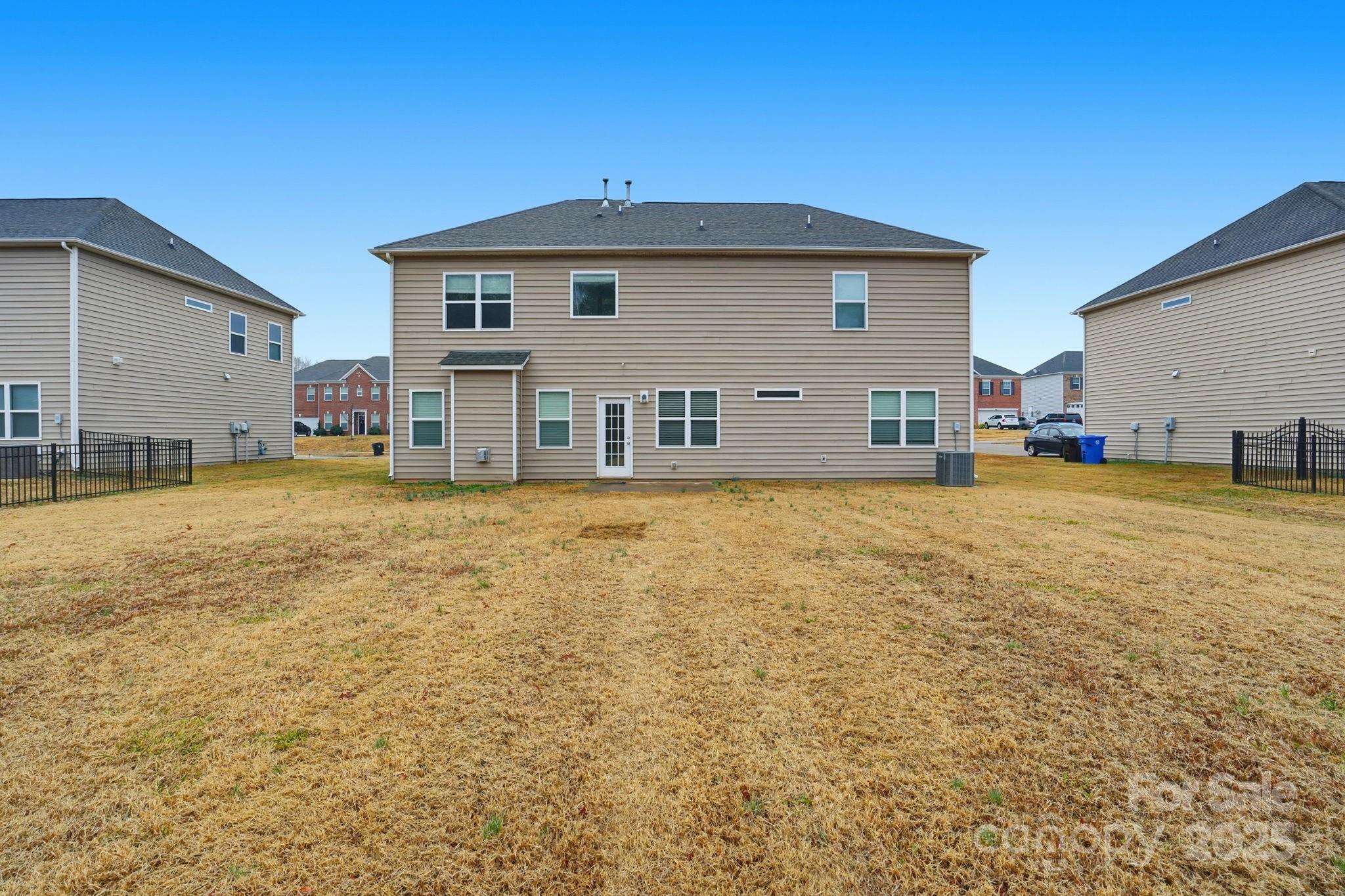 182 Sassafras Road Mooresville, NC 28115 - Photo 46 of 47 a front view of a house with a yard