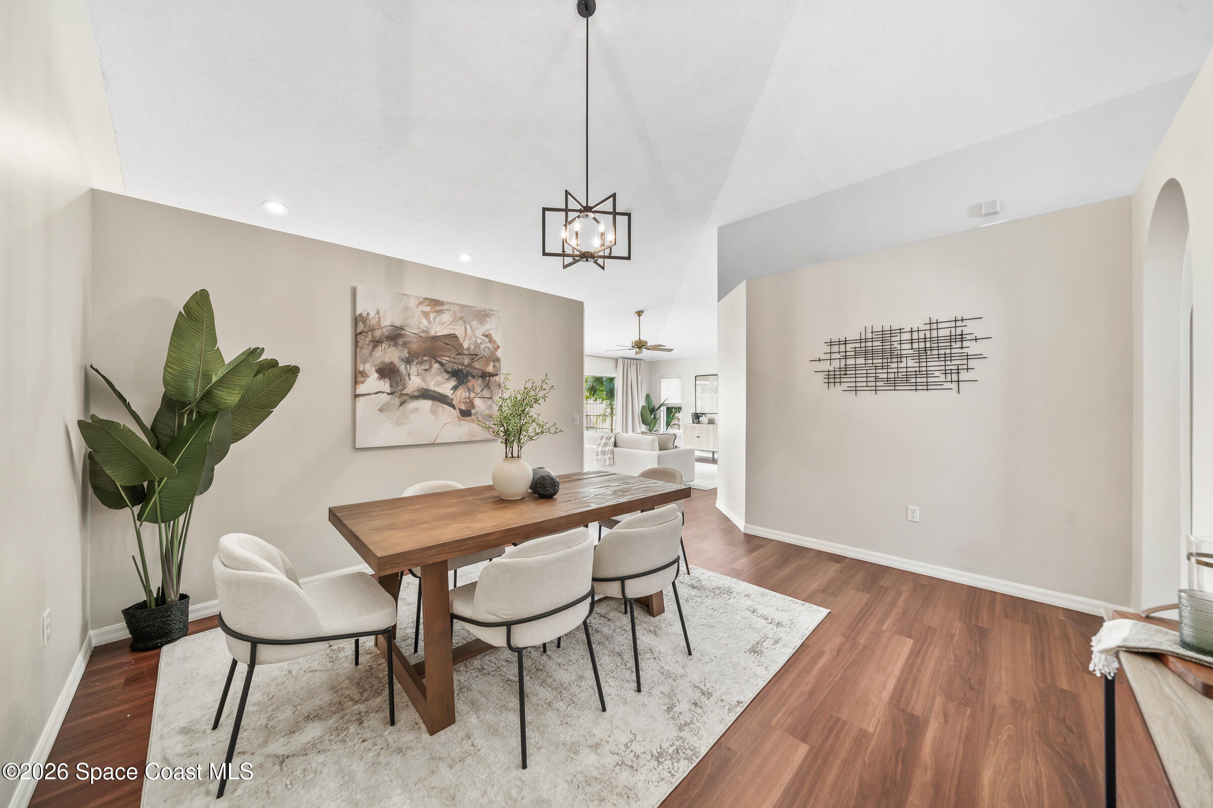 332 Brookcrest Circle Rockledge, FL 32955 - Photo 18 of 38 a view of a dining room with furniture and wooden floor