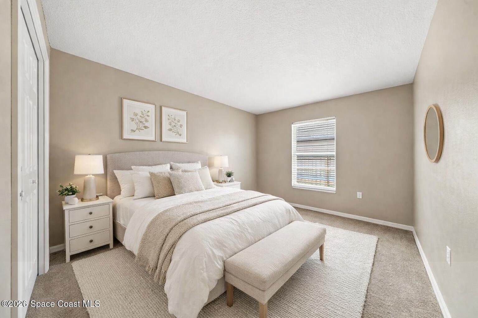 332 Brookcrest Circle Rockledge, FL 32955 - Photo 25 of 38 a bedroom with a bed and a window