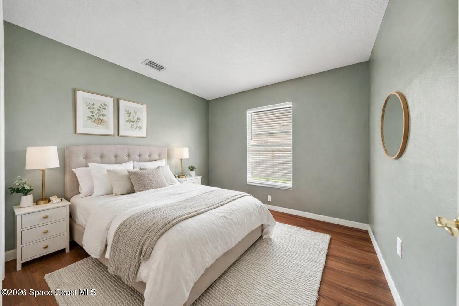 332 Brookcrest Circle Rockledge, FL 32955 - Photo 31 of 38 a spacious bedroom with a bed and a window