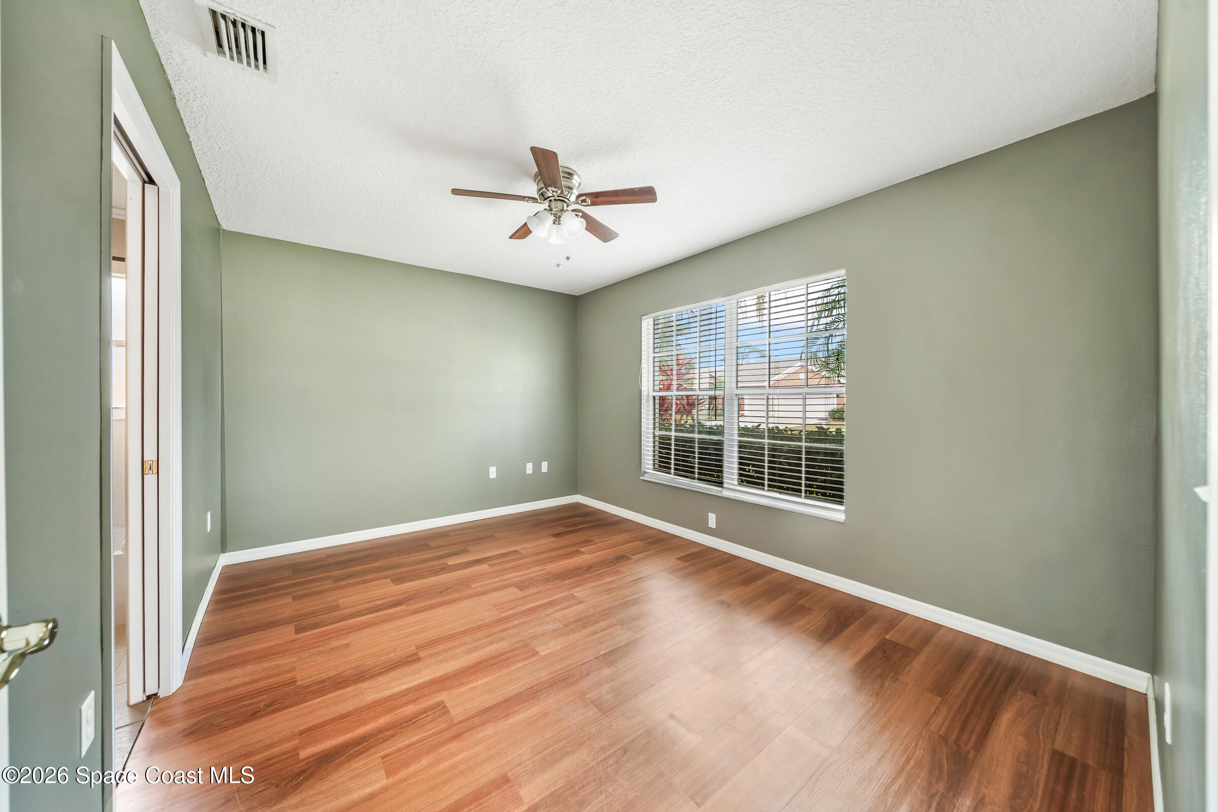 332 Brookcrest Circle Rockledge, FL 32955 - Photo 32 of 38 a view of an empty room with a window