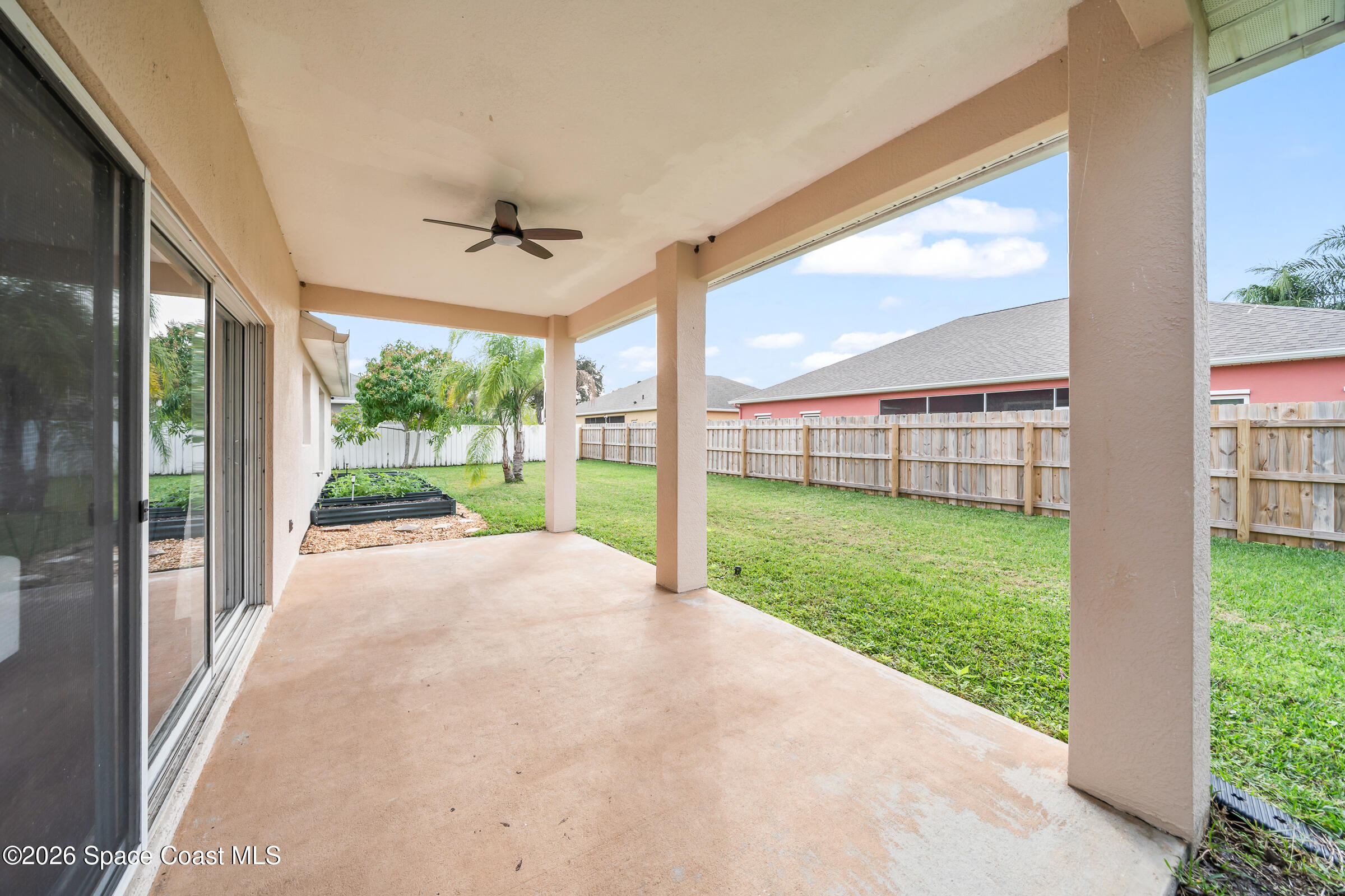 332 Brookcrest Circle Rockledge, FL 32955 - Photo 35 of 38 a view of a porch with a garden