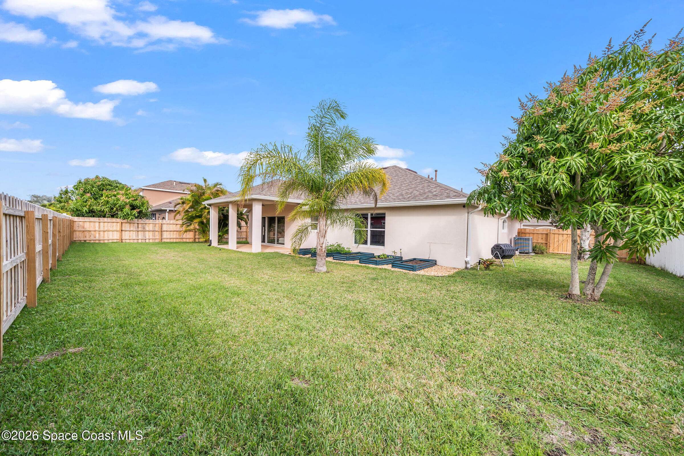 332 Brookcrest Circle Rockledge, FL 32955 - Photo 36 of 38 a front view of house with yard and trees