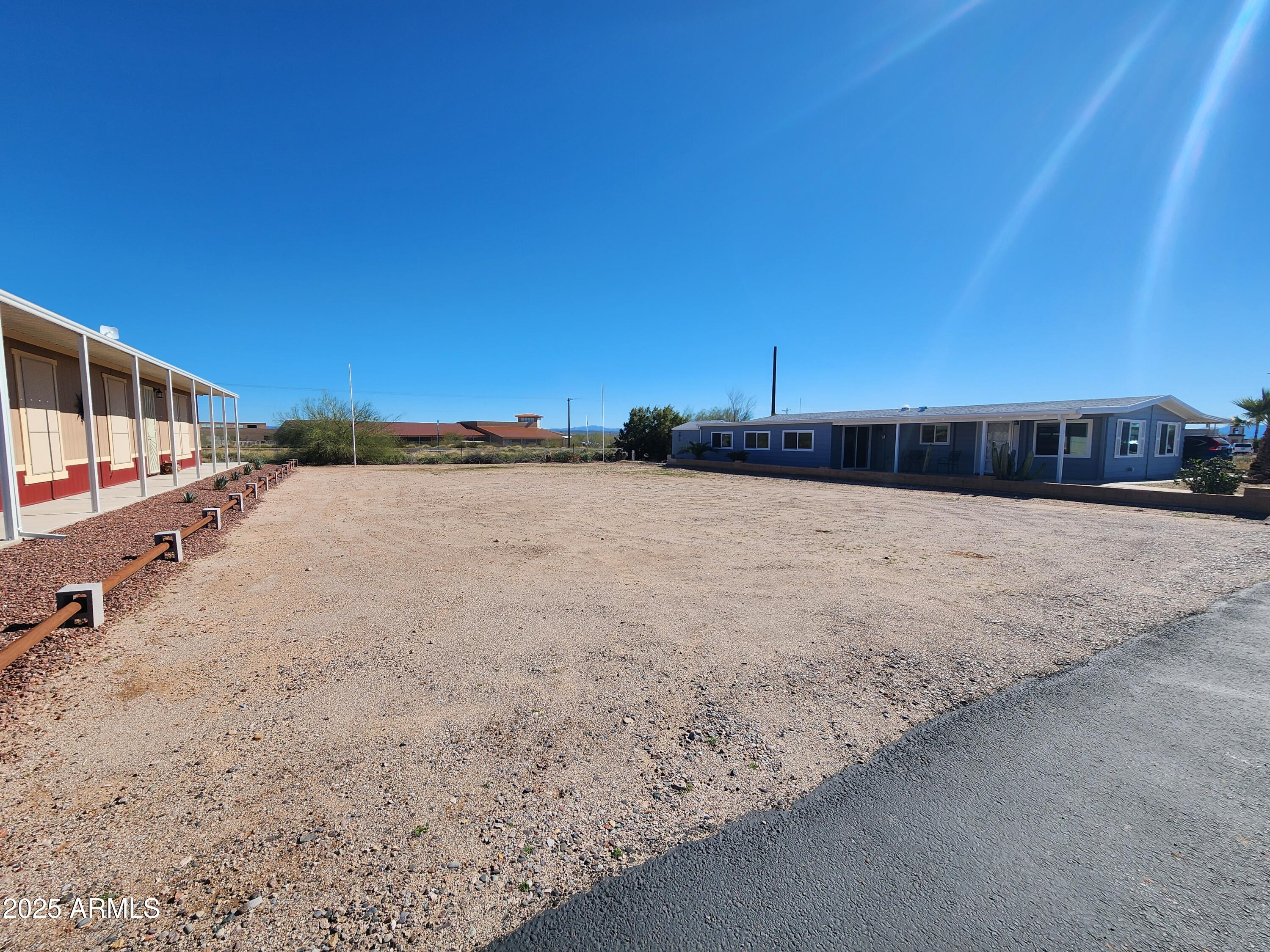 3603 North Colorado Avenue, Unit 914 Florence, AZ 85132 - Photo 2 of 11 a view of a house with a yard