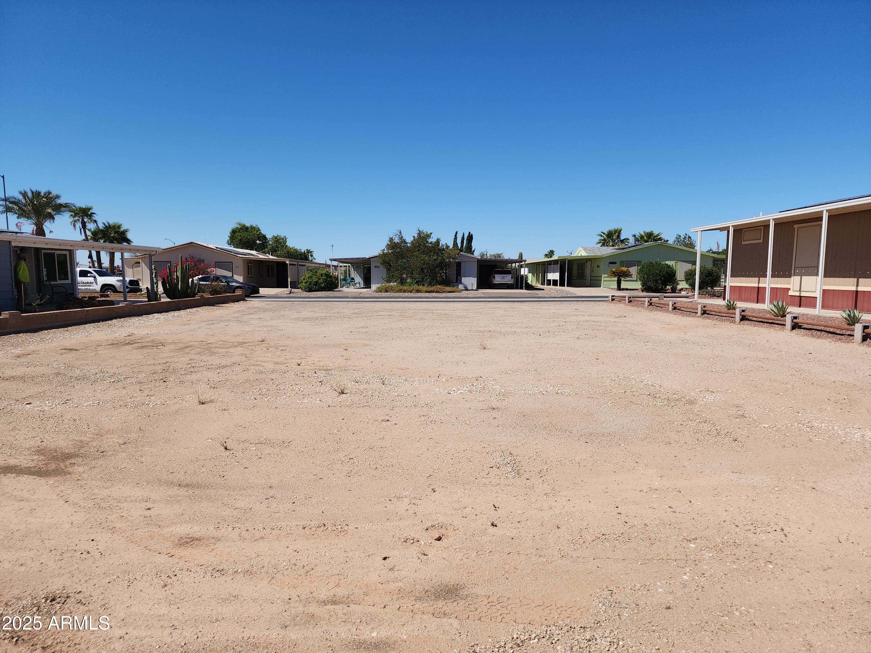 3603 North Colorado Avenue, Unit 914 Florence, AZ 85132 - Photo 4 of 11 a view of a street with cars parked