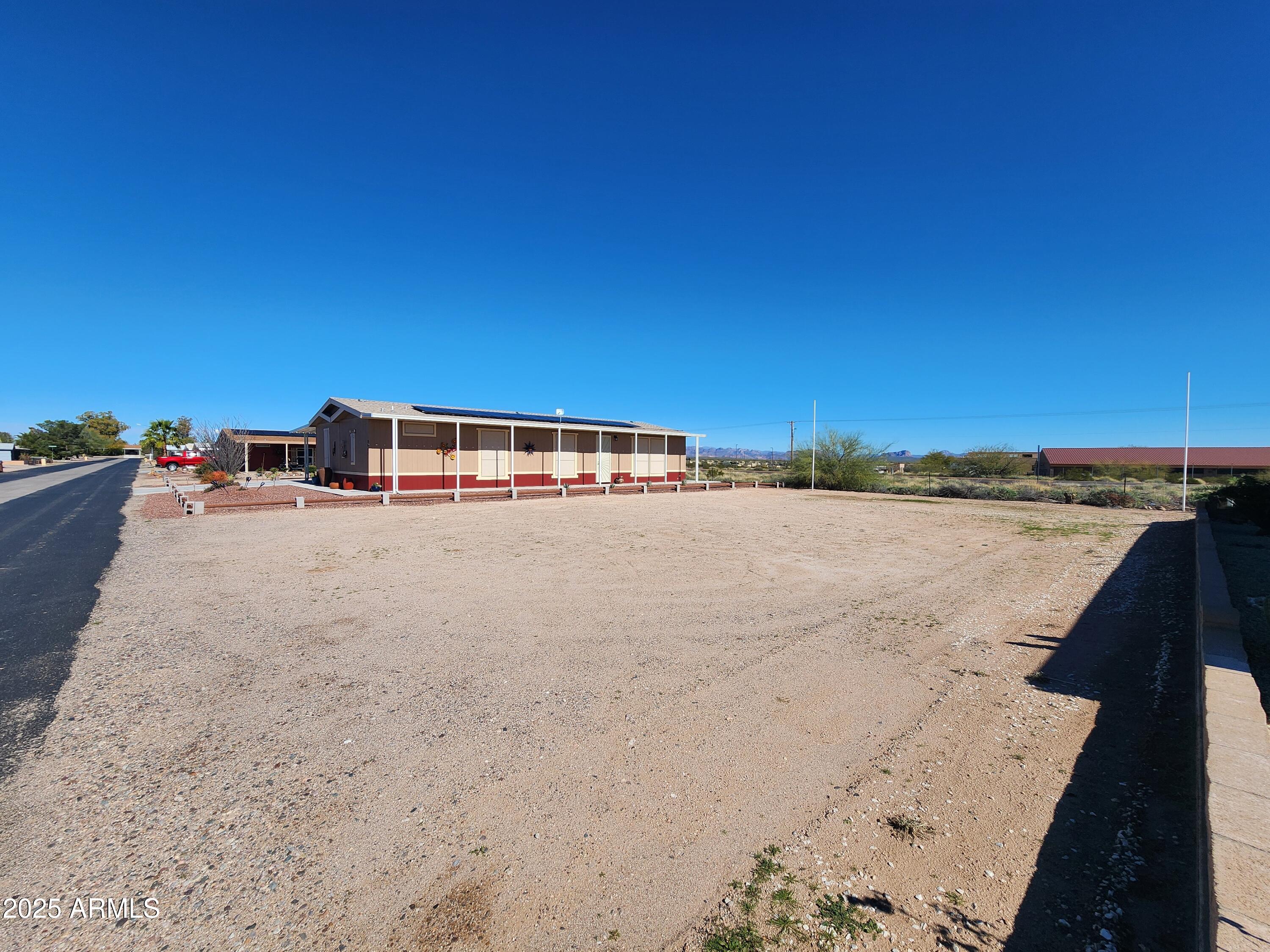 3603 North Colorado Avenue, Unit 914 Florence, AZ 85132 - Photo 6 of 11 view of ocean with a big yard